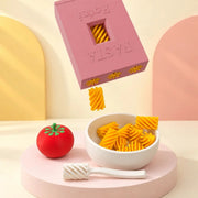 Rosa · La pasta cae de la caja al bol